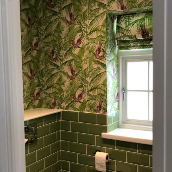 Bathroom with Feature Wall Paper and Green Tiles